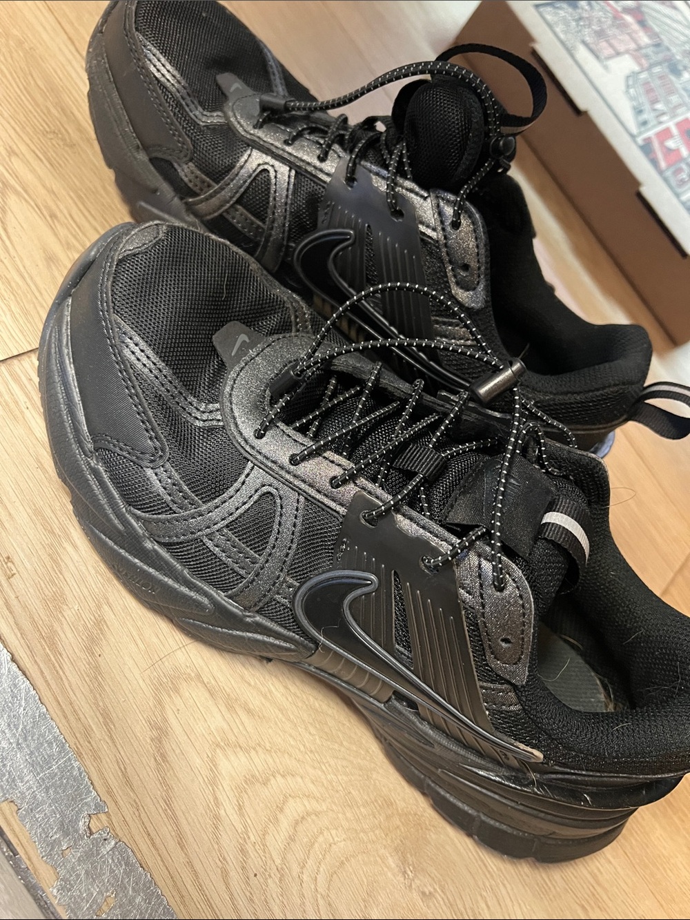 Nike Men’s Black Athletic Sneakers with Reflective Accents
